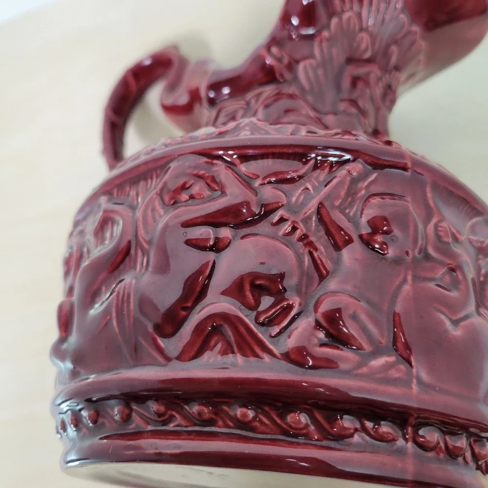 Vintage Burgundy Ceramic Pitcher Jug Relief Figures‎ Embossed Floral Design